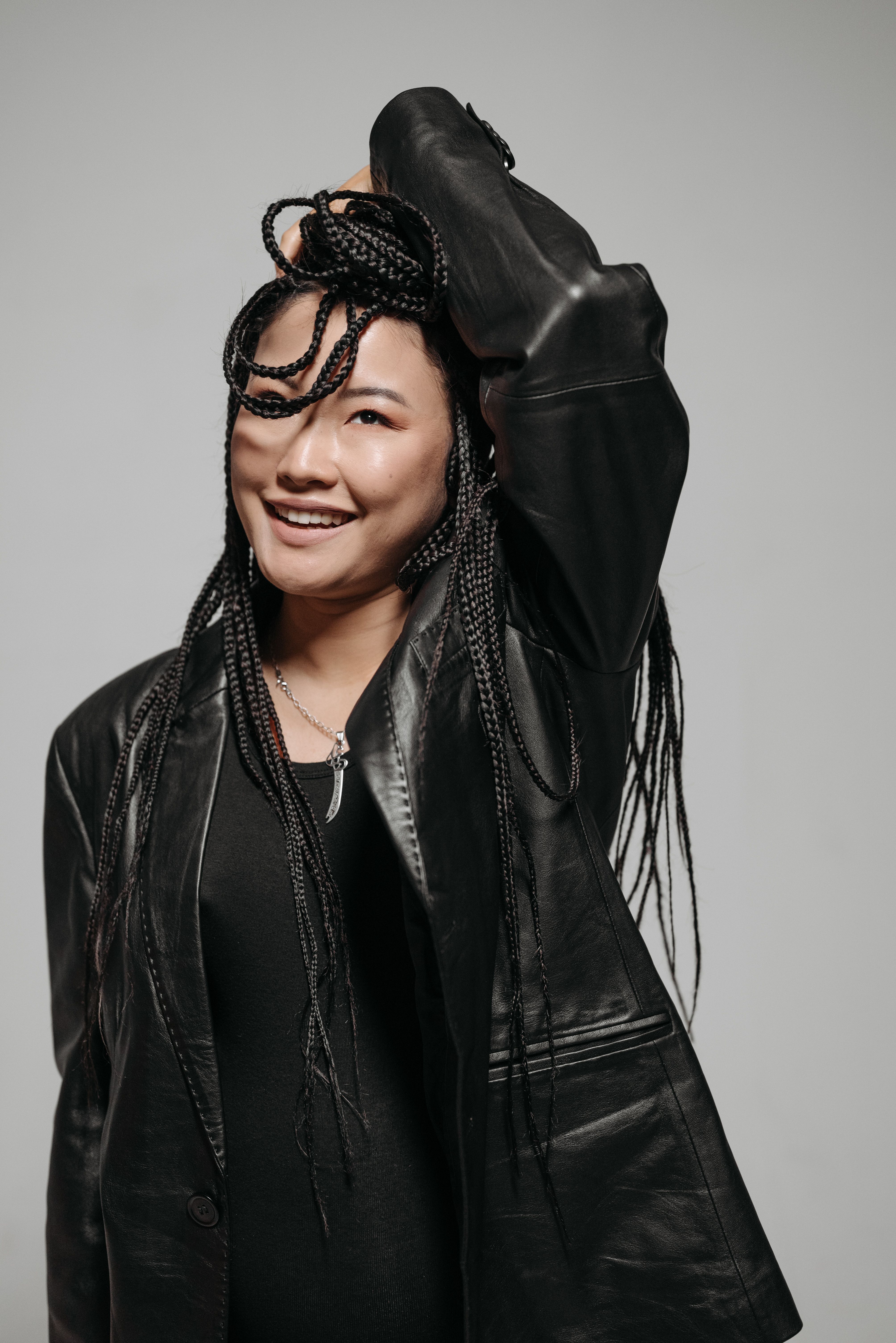 Smiling Woman in Black Leather Jacket · Free Stock Photo