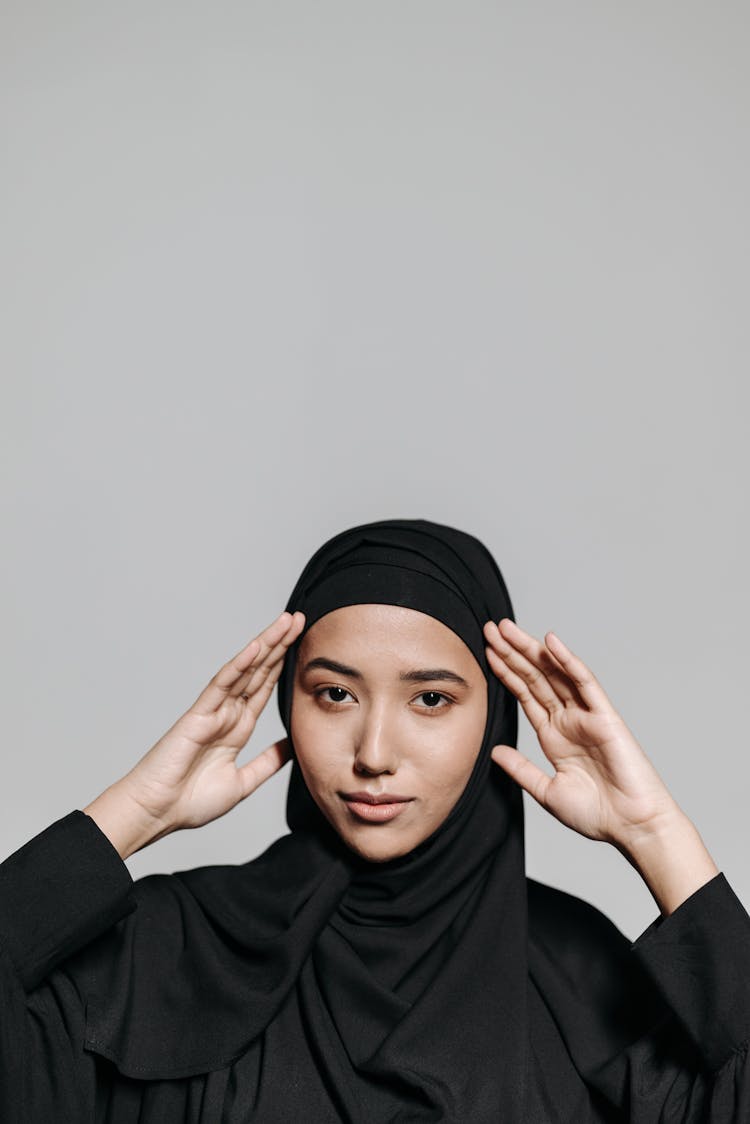 Woman In Black Hijab And Abaya