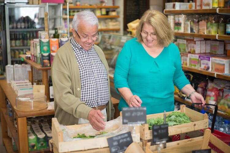 Elderly Couple Buying Groceries