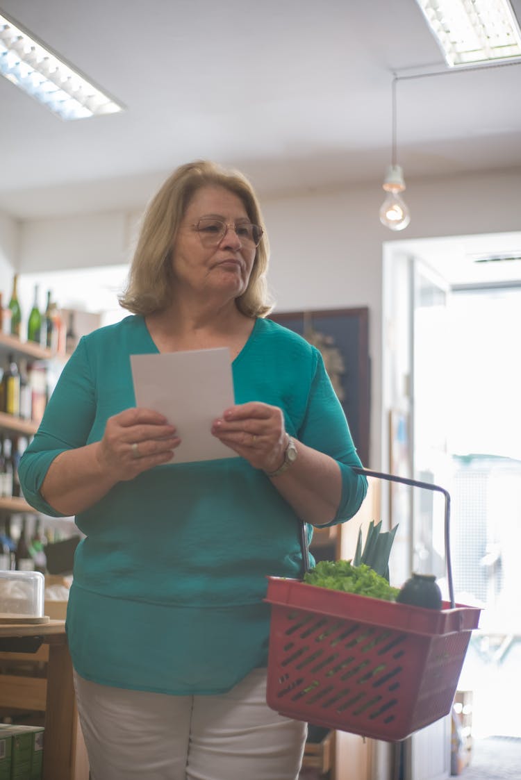 Woman Doing Shopping At A Grocery