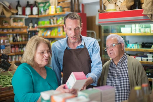 A shopkeeper assists elderly customers in a vibrant Portuguese grocery store.