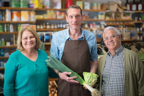 Shoppers and a Store Clerk