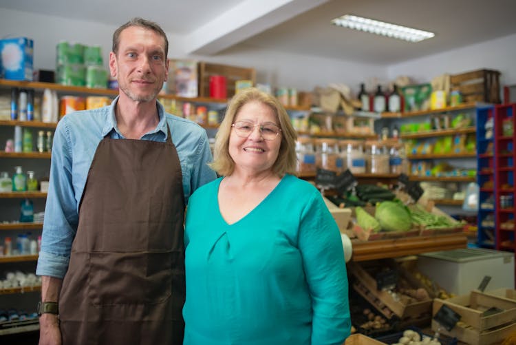 A Man And A Woman Inside A Store