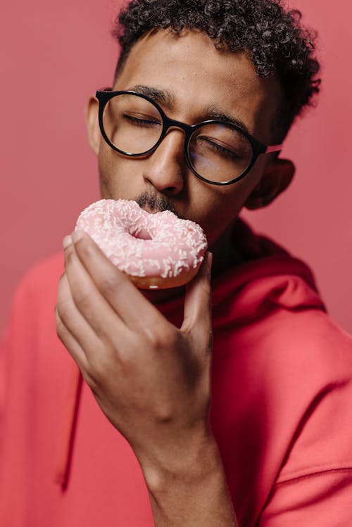 A Man Eating Donut