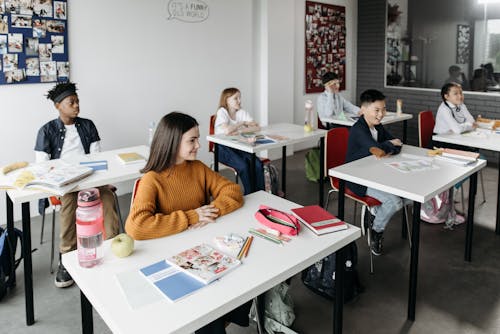 Free Students Sitting at the Table Stock Photo