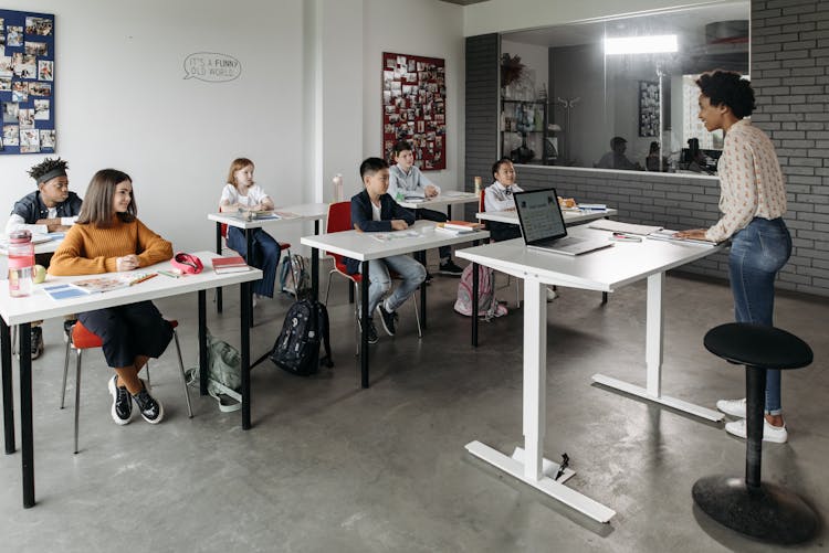 Students Listening To Their Teacher