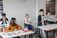 Children Sitting at the Table