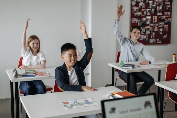 Students Raising Their Hands