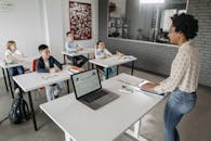 Teacher Standing in Front of her Students