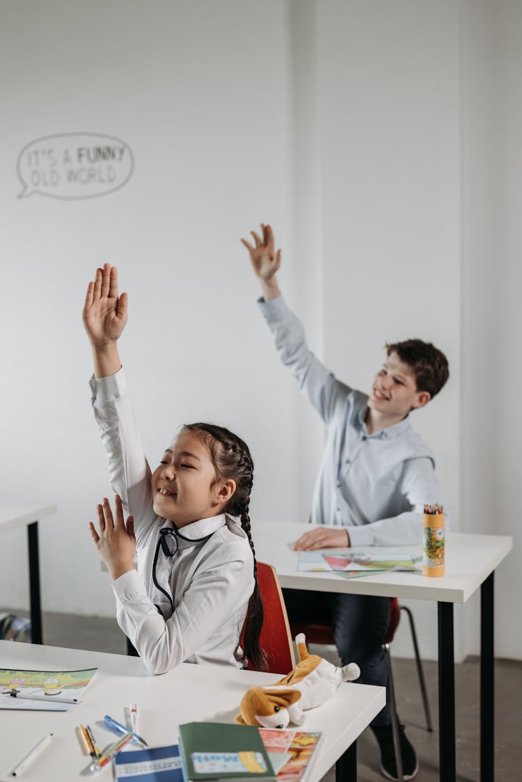 Students Sitting At The Table