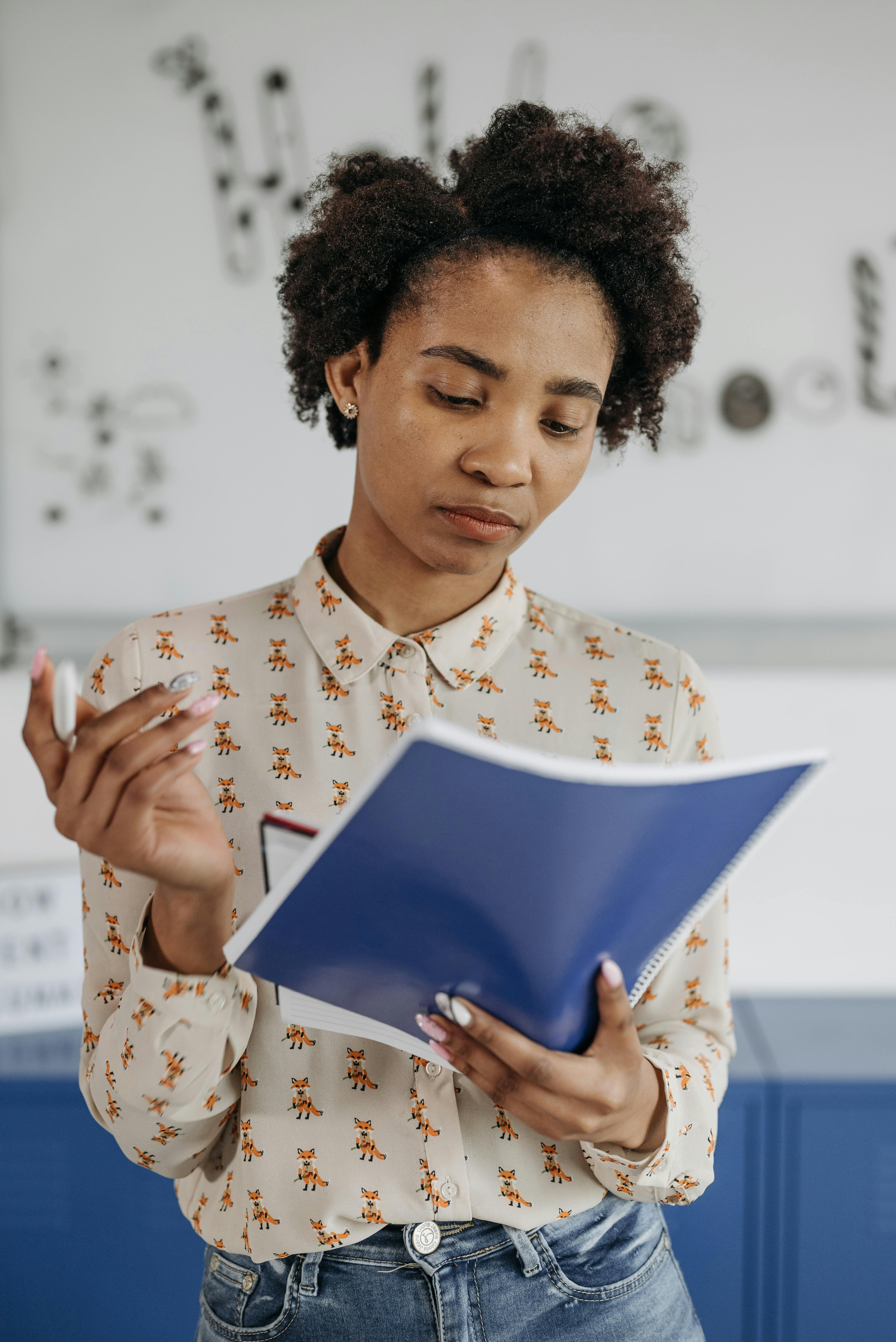 Photo of a Female Wearing Framed Eyeglasses · Free Stock Photo