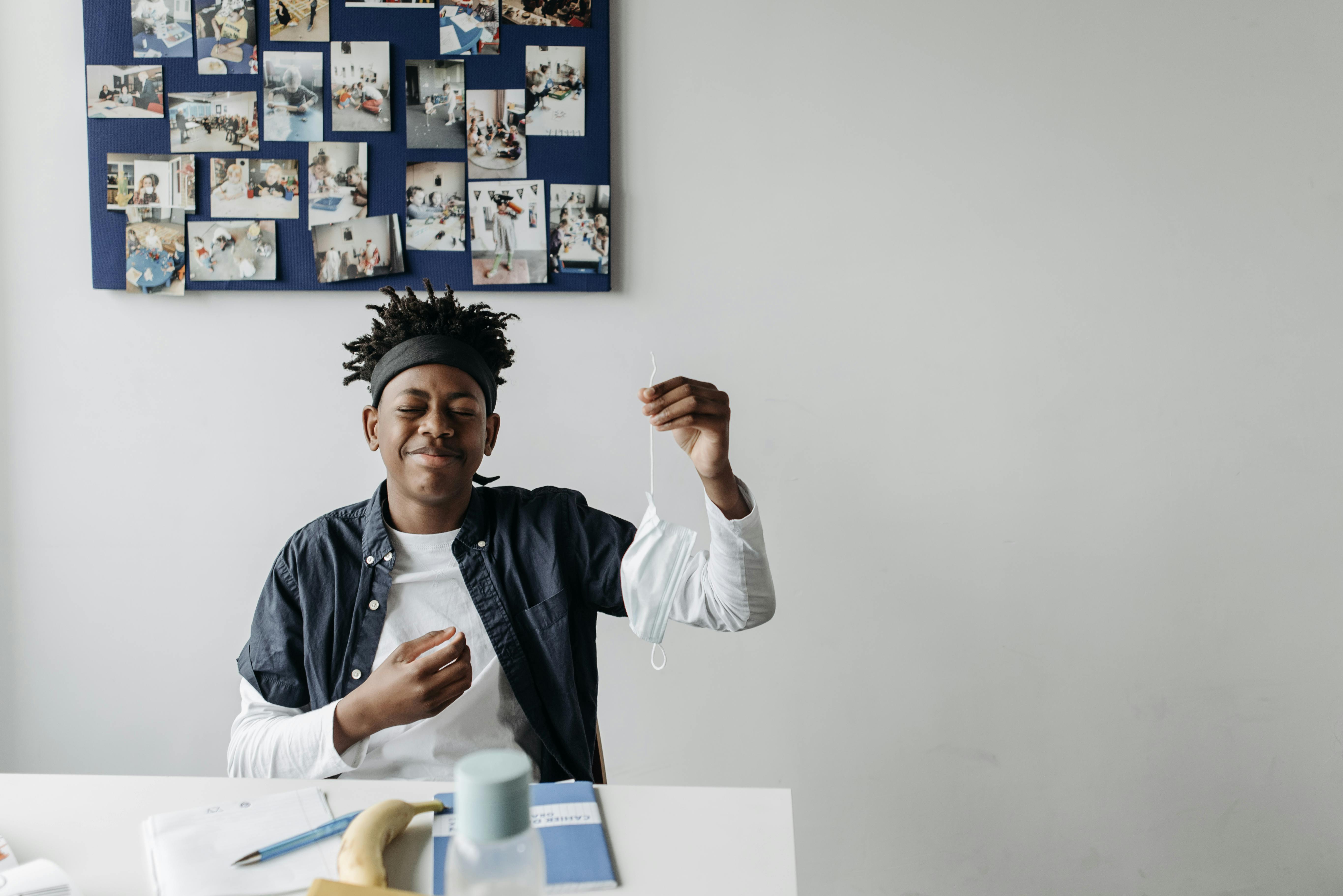 A classroom filled with happy students collaborating on a group activity, symbolising teamwork and effective learning.