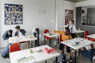 Students Throwing Crumpled Papers