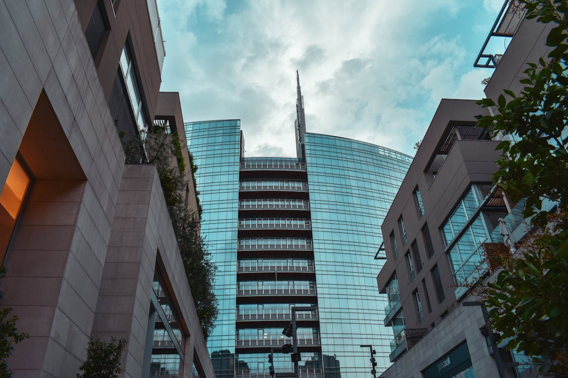 Modern Buildings Under White Clouds