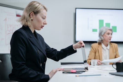 Woman Opening Her Laptop