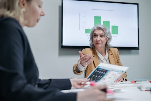 Business Women Having a Meeting Inside the Office