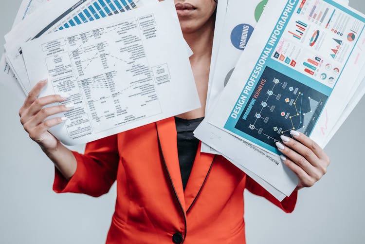 A Person Holding Documents