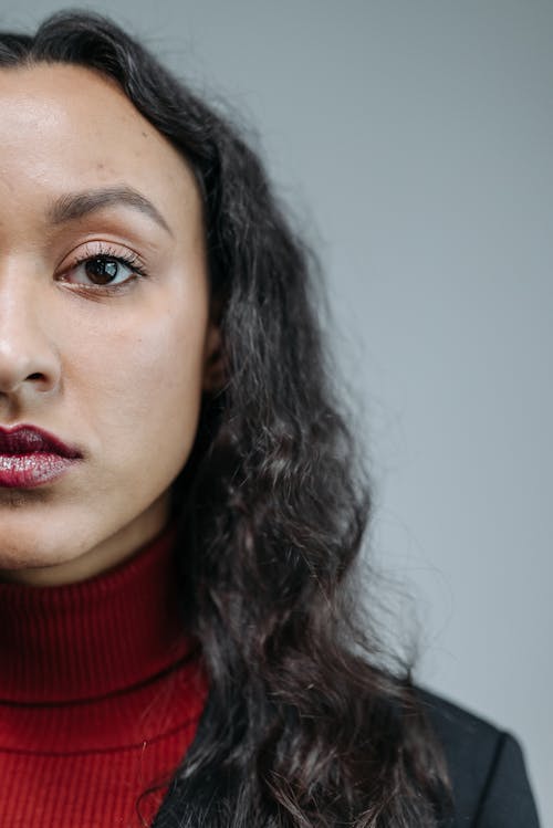 Woman in Red Turtleneck Sweater