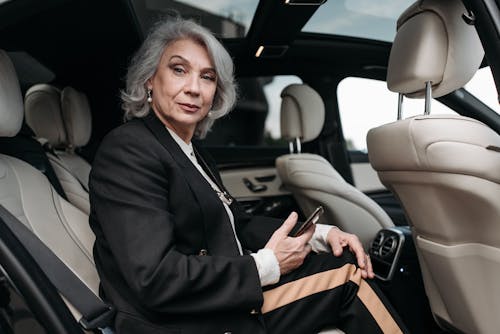 An Elderly Woman in a Car