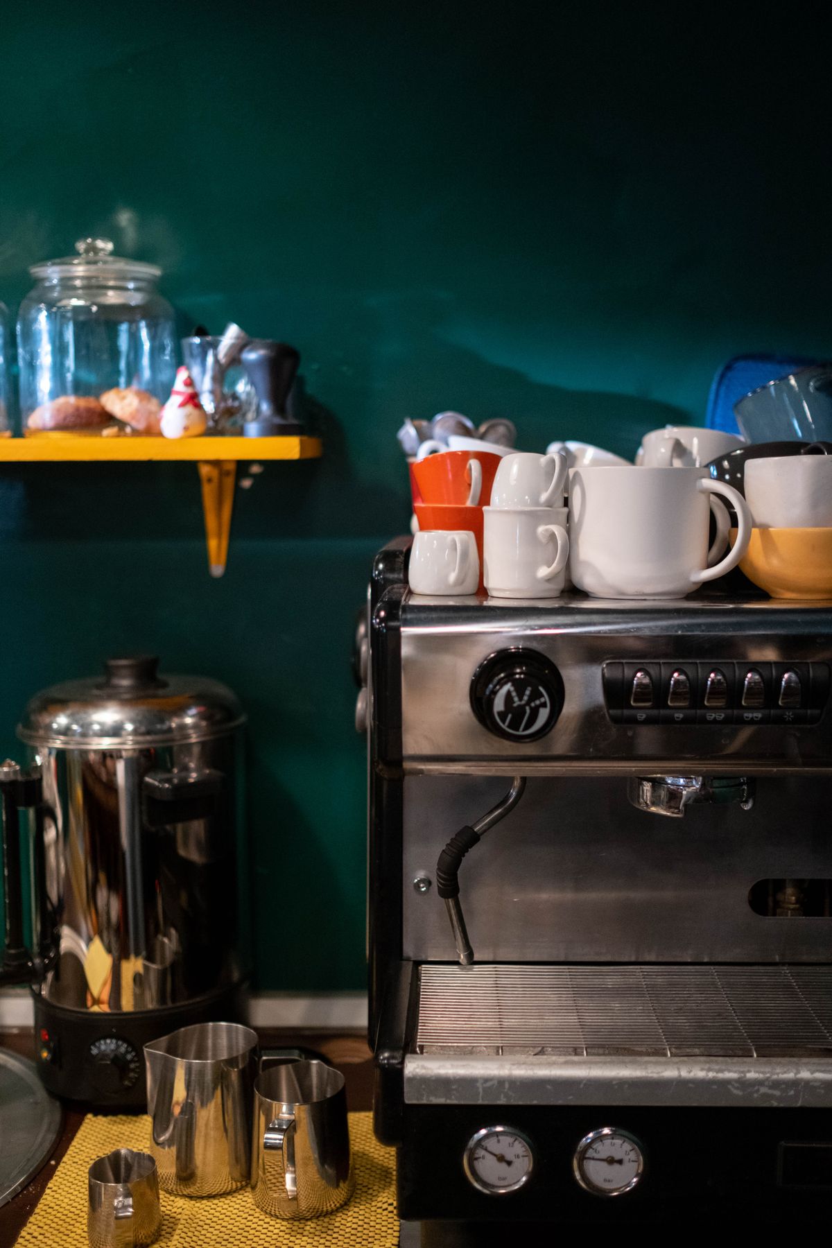 Compact espresso machine on a kitchen counter, for illustration