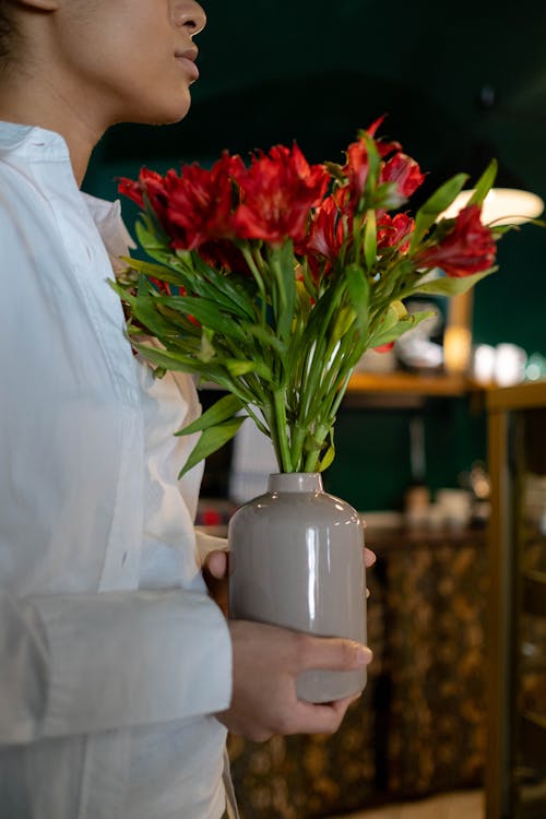 Free Red Flowers in a Ceramic Vase Stock Photo