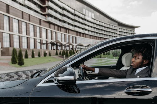 Gratis stockfoto met Afro-Amerikaanse man, autorijden, bestuurder