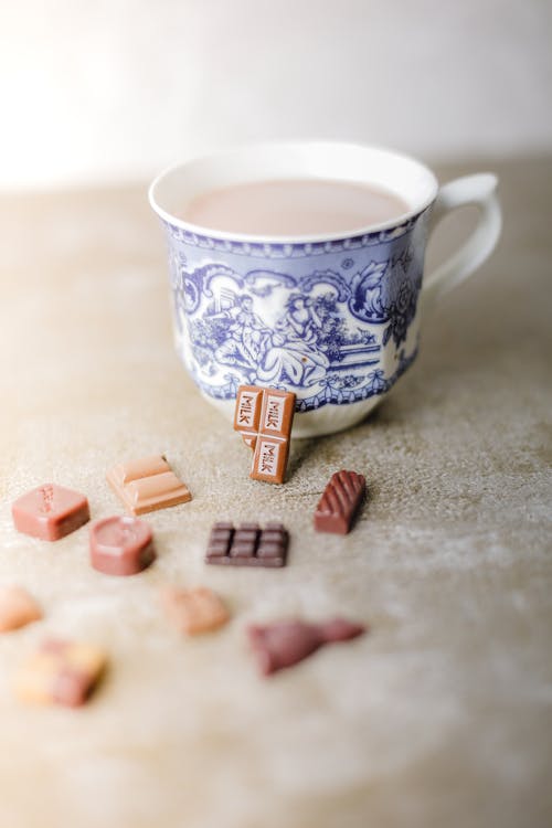 Free Chocolate near Coffee Cup Stock Photo
