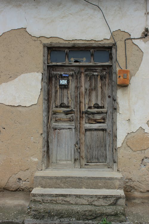Wooden Door to a Dilapidated Building