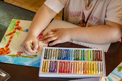 Free A Person Coloring With Oil Pastels Stock Photo