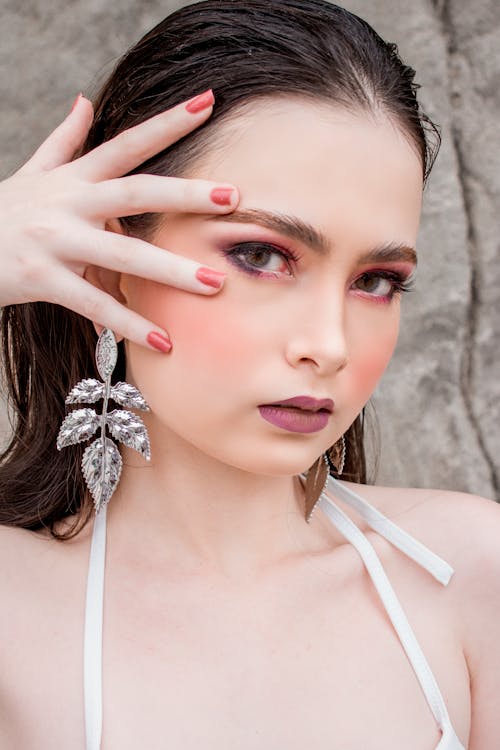 Beautiful Woman Posing with Hand on Face