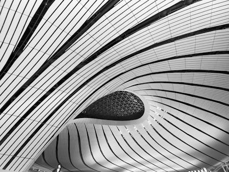 Explore the intricate curved design of Beijing Daxing Airport's modern architecture.
