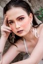 Attractive Woman Posing with Hand on Face