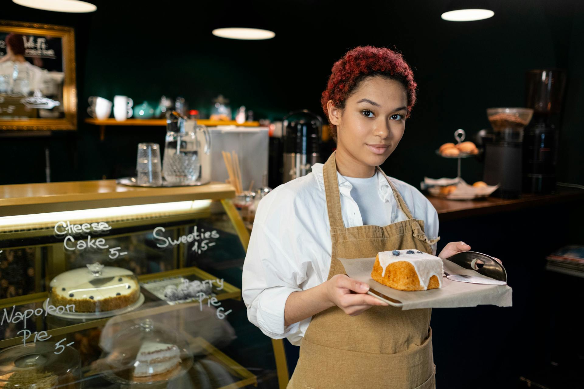Woman Serving a Cake