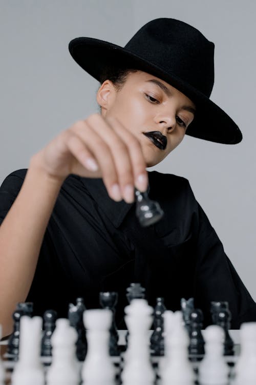 Free Woman Playing Chess Stock Photo