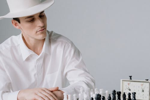 Man Playing Chess