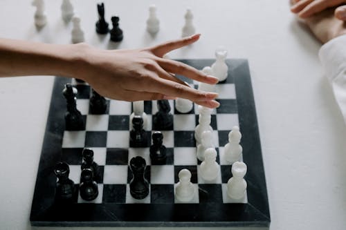 Free Person Playing Chess Stock Photo