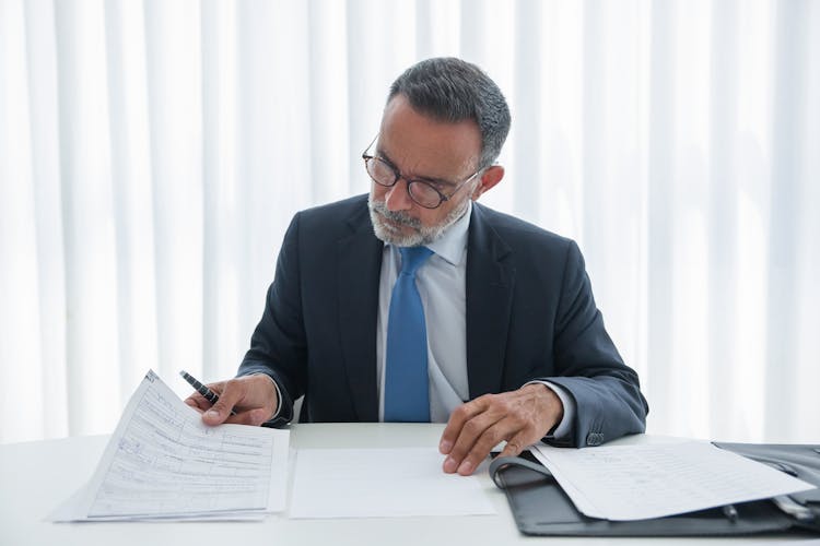 A Businessman Reading Documents