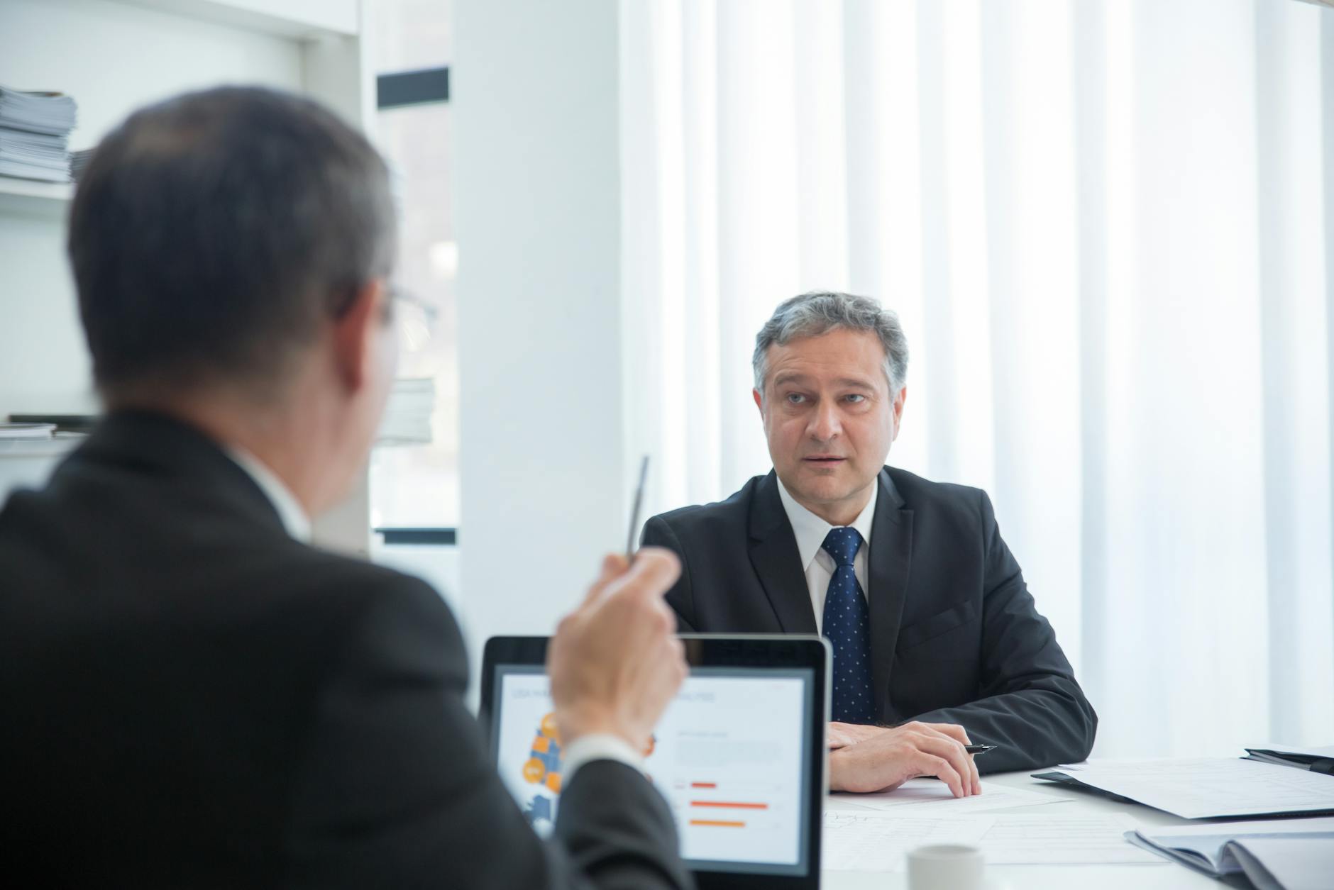 https://www.pexels.com/photo/men-having-a-conversation-8428082/