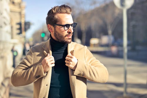 Free Man Wearing Eyeglasses and Brown Jacket Stock Photo