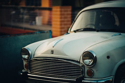 White Classic Car in Close Up Photography