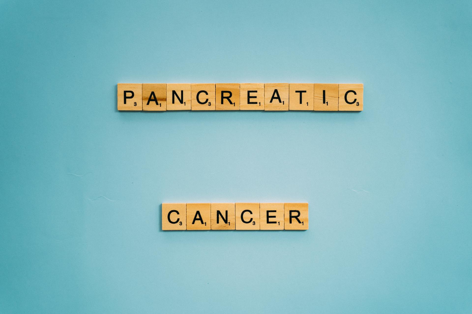 Wooden Sign with the Letters Pancreatic Cancer