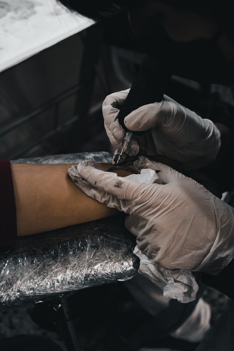 A Person Getting A Tattoo