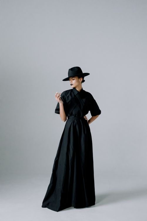 A Woman in a Black Dress Posing · Free Stock Photo