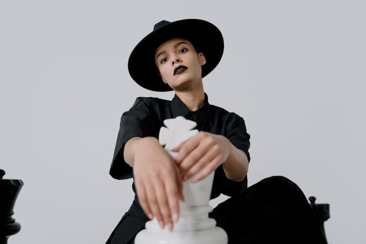 Woman In Black Hat With Black Lips