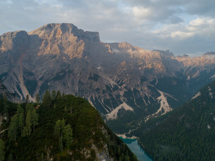 Rocky Steep Mountains Over A Lake In The Valley 