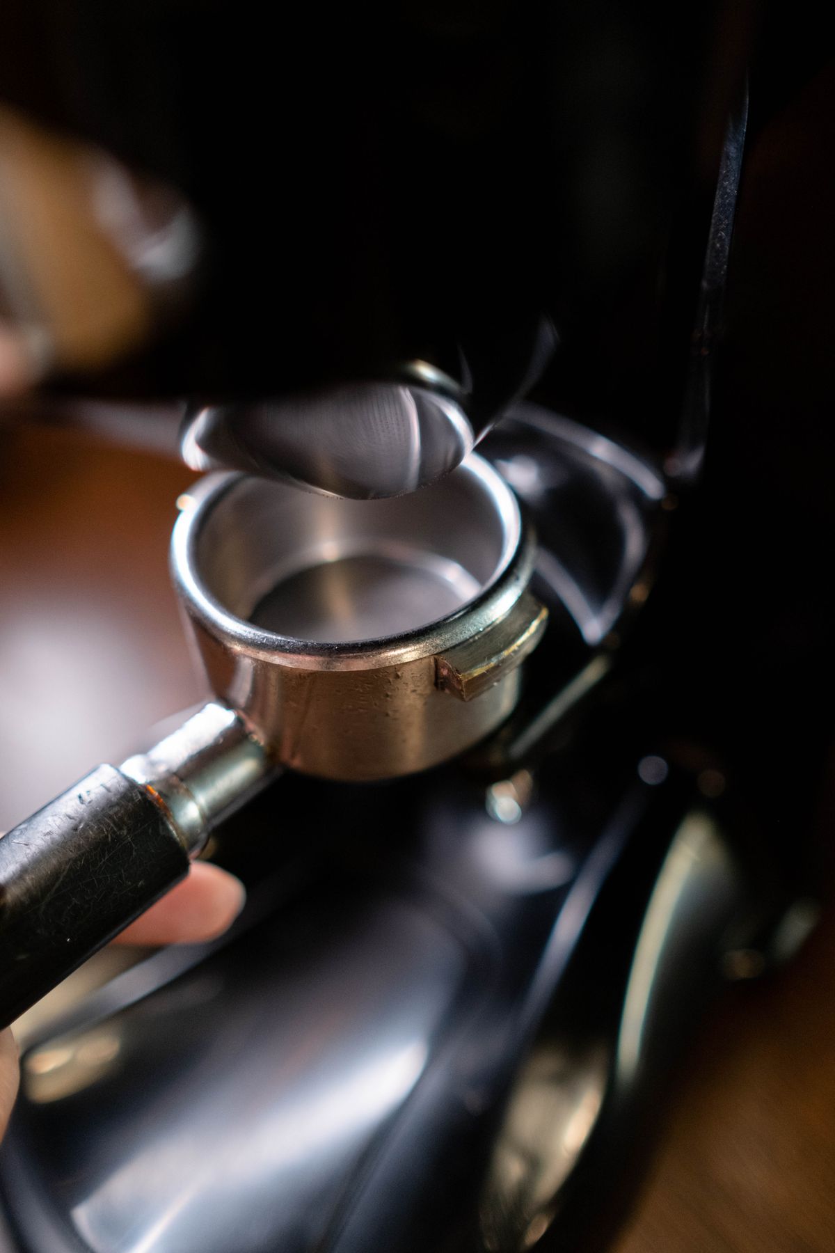 Close-up of an espresso machine portafilter, for illustration
