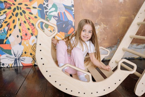 A Girl in a Wooden Rocker