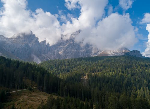 Clouds above Mountains and Valley · Free Stock Photo