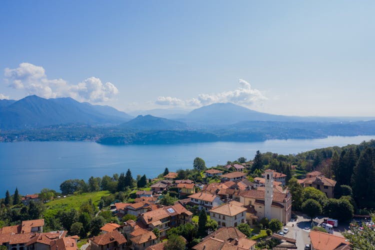 Aerial View Of City Near Body Of Water