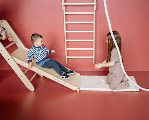 Children Playing on a Slide